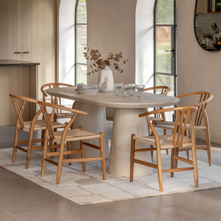 Arbor Oval Dining Table – Travertine-Style Finish