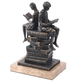 Keiichi Reading Figures Sculpture