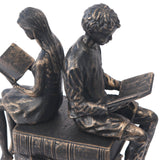 Keiichi Reading Figures Sculpture
