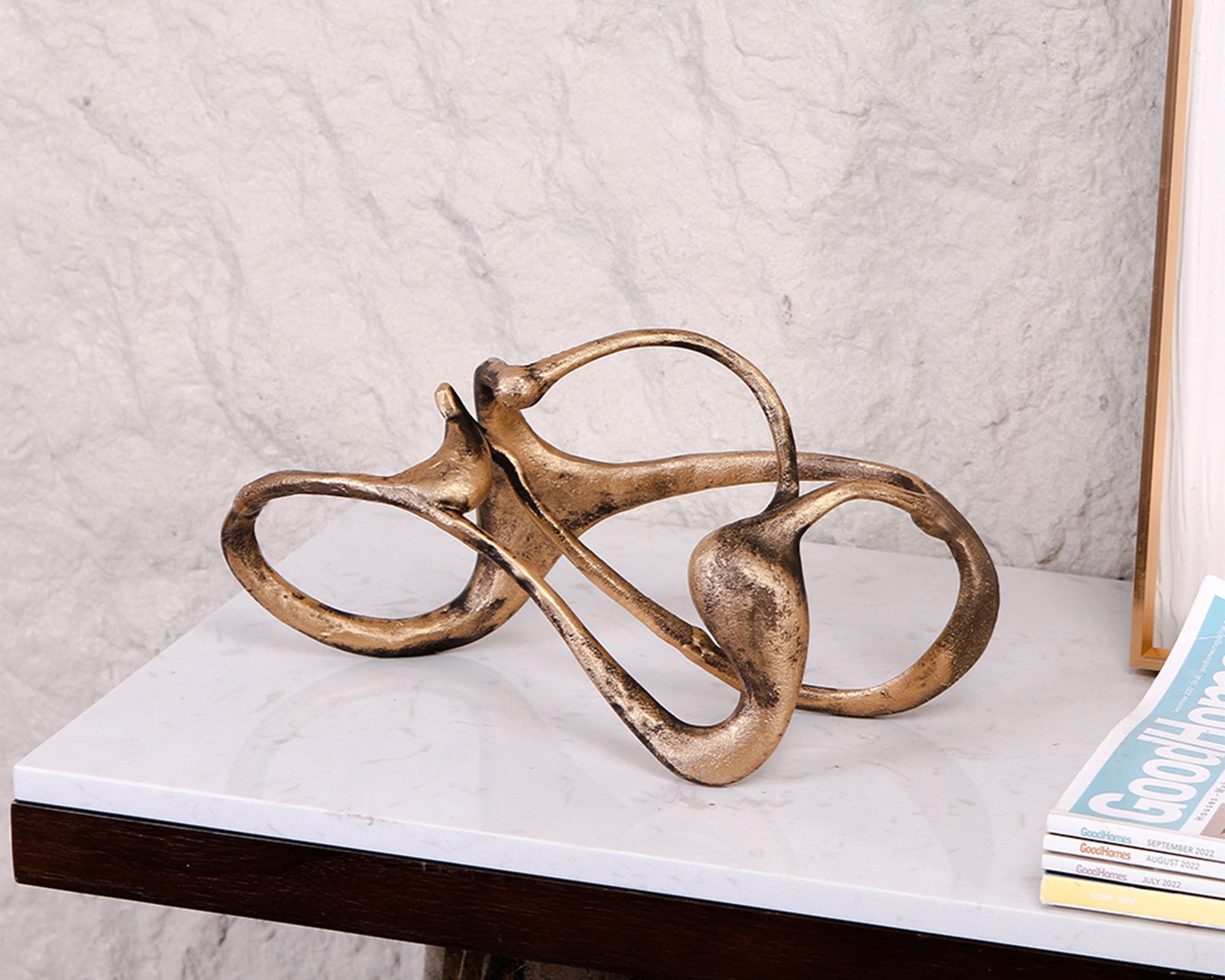 Liang & Eimil Aion Sculpture – Golden Bronze