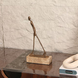 Liang & Eimil Stride Sculpture