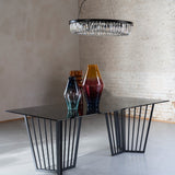 Libra Interiors Abington Dining Table with Black Frame and Tinted Glass