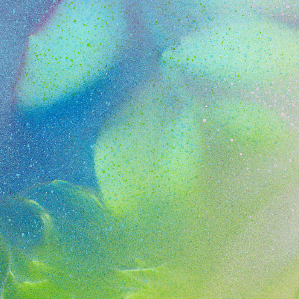 Abstract pattern of blue and green colors with speckles
