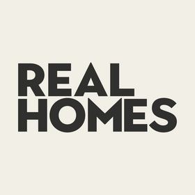 Text 'REAL HOMES' in black on a beige background